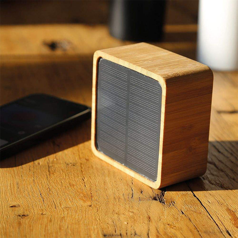 Wood color portable wireless solar speaker