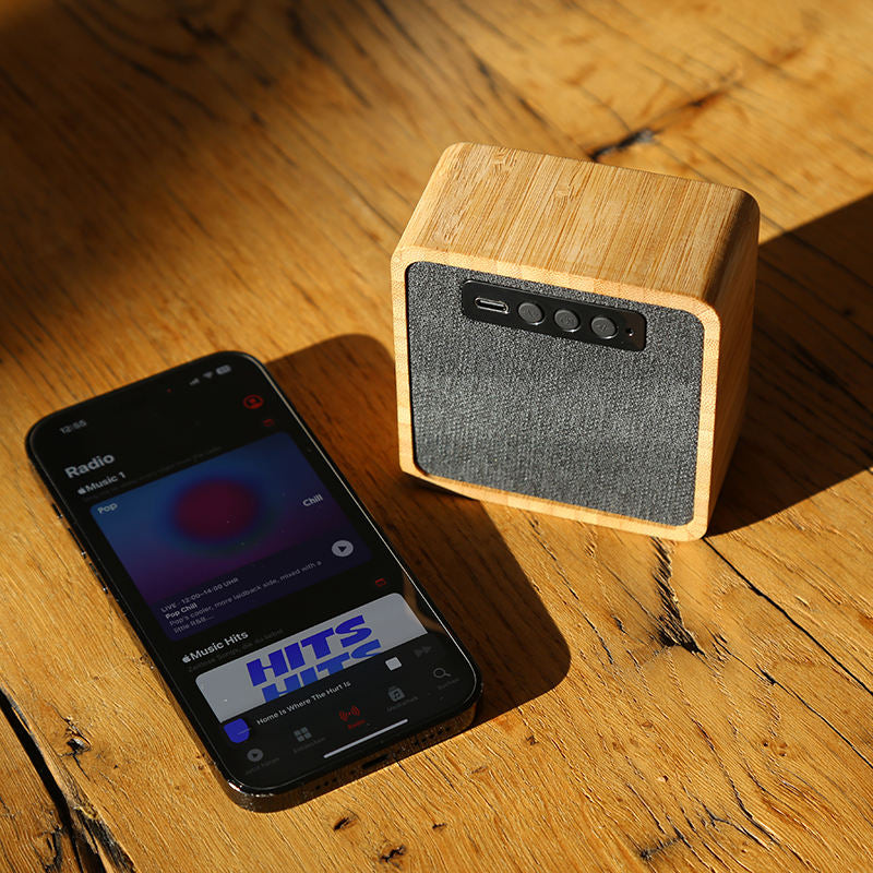 Wood color portable wireless solar speaker