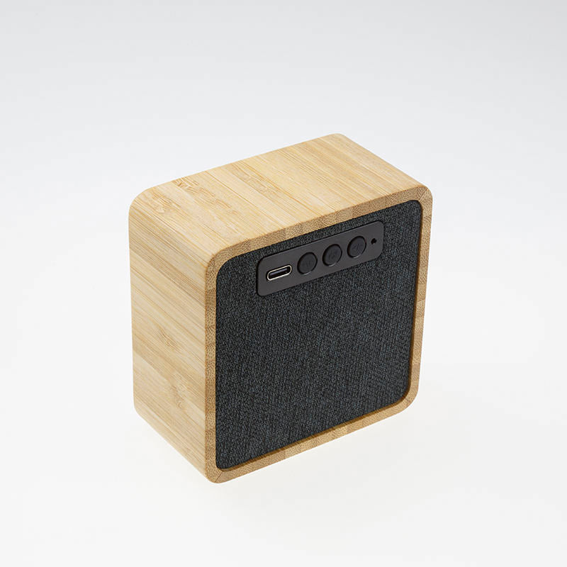 Wood color portable wireless solar speaker