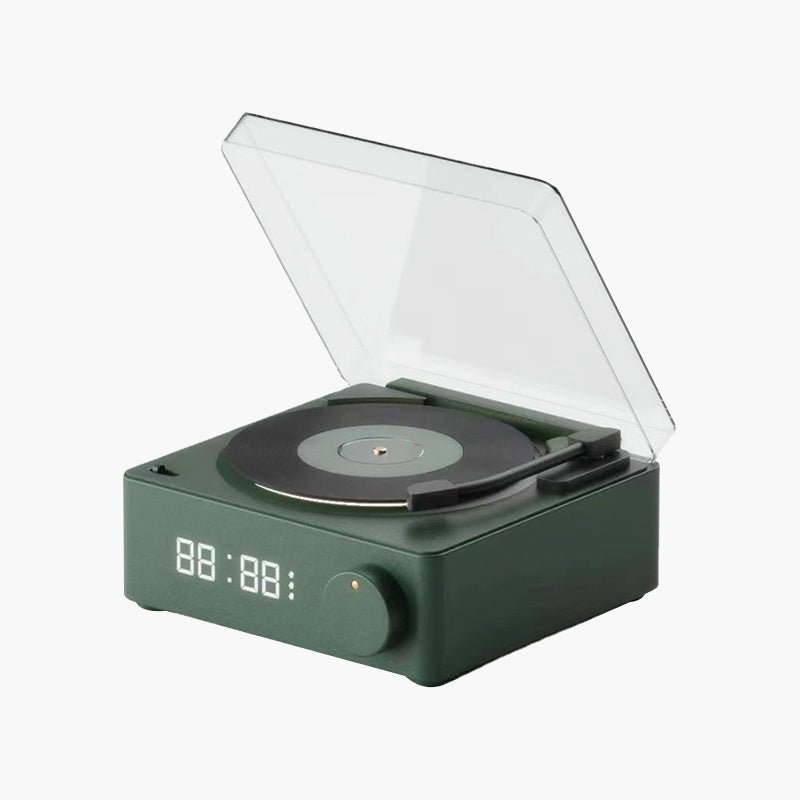 Vinyl record shaped speaker with time display