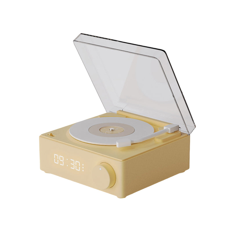 Vinyl record shaped speaker with time display