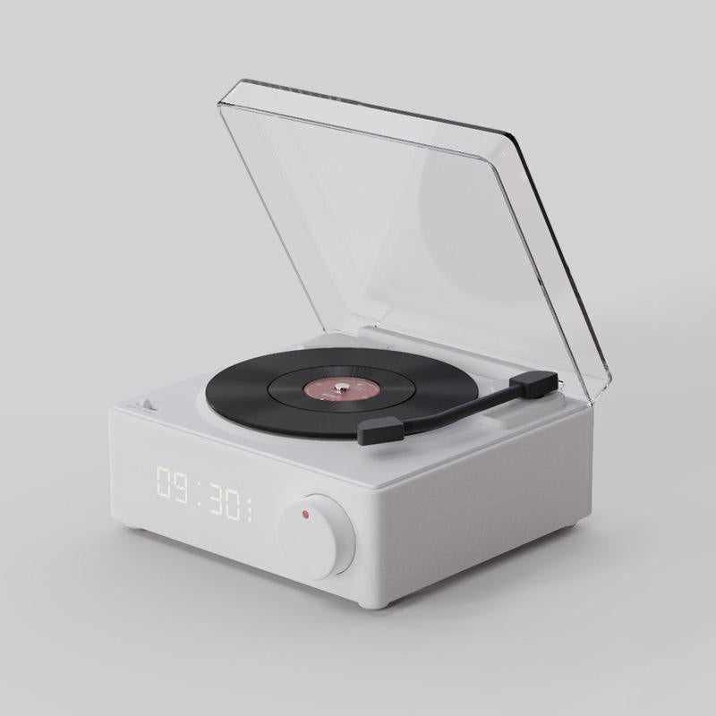 Vinyl record shaped speaker with time display