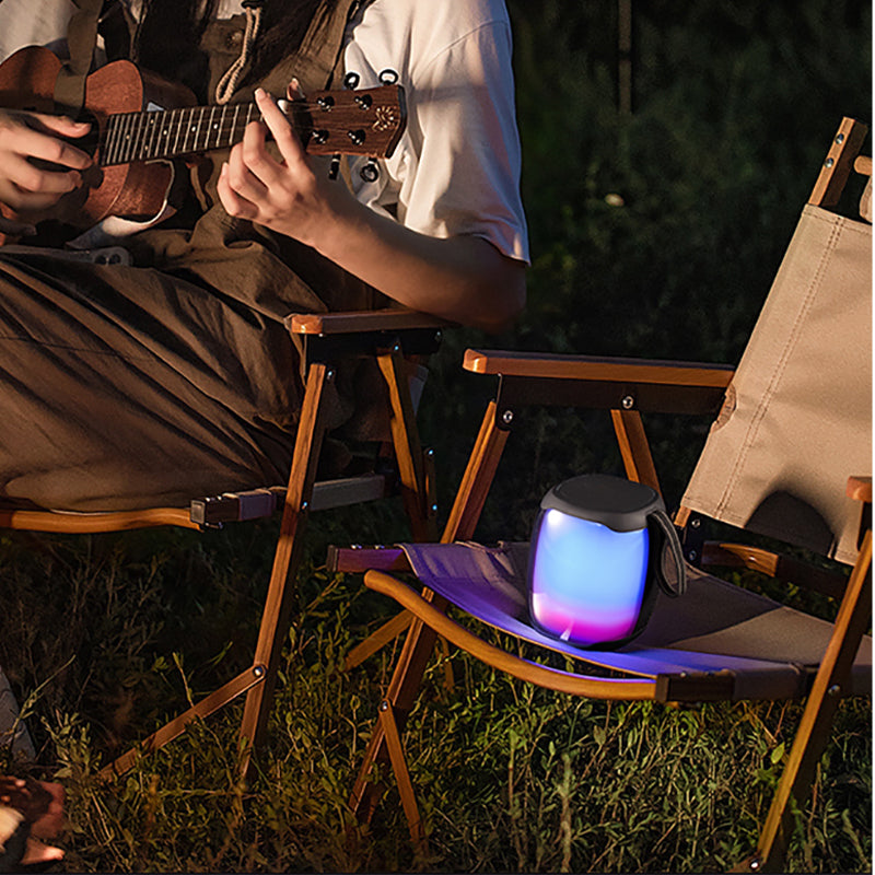 Portable wireless speaker with night light